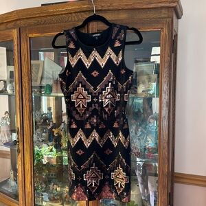 Casual black dress with sequin pattern